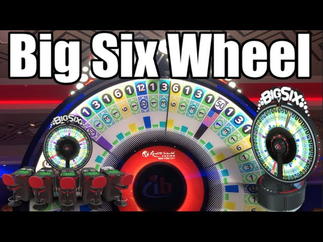 A large, colorful "Big Six Wheel" at a casino, an easy-to-understand game where players bet on the outcome of the spinning wheel.