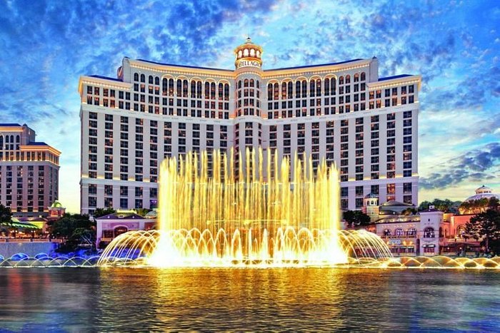 "Bellagio Resort and Casino in Las Vegas, Nevada, featuring its iconic fountain show at dusk."