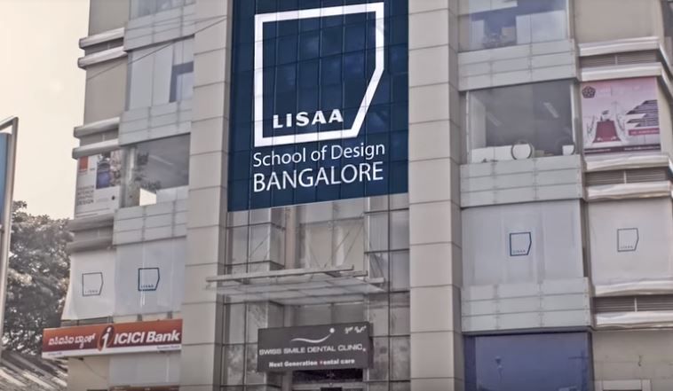  A modern glass-fronted building displaying the LISAA School of Design Bangalore signage, highlighting its presence as a leading institute for fashion and design education.